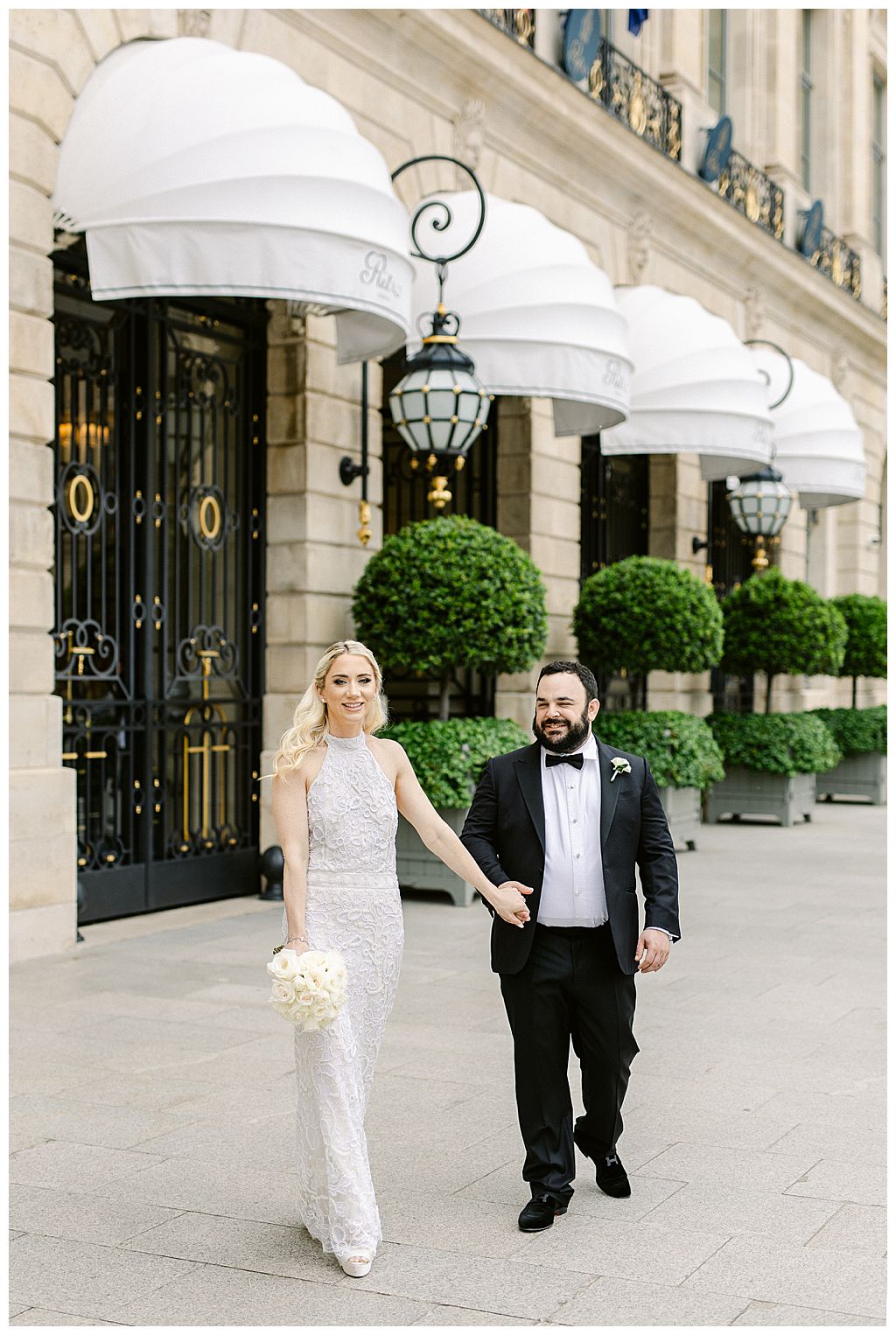 couple in front of the Ritz Paris